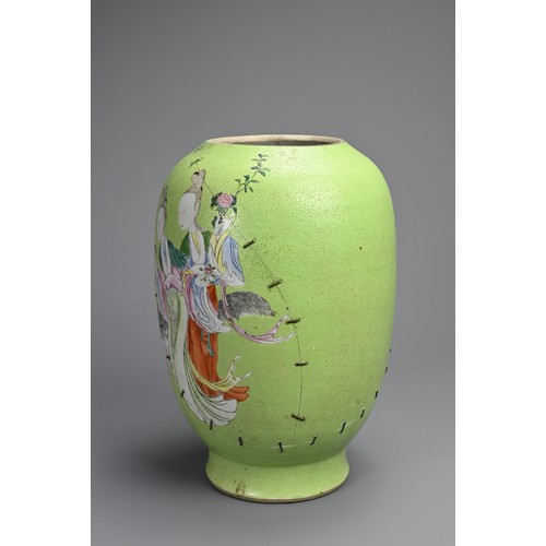 102 - A CHINESE FAMILLE ROSE LIME GREEN GROUND SGRAFFITO VASE, 19TH CENTURY. Lantern form decorated with l... 