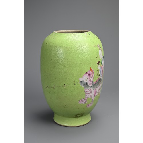 102 - A CHINESE FAMILLE ROSE LIME GREEN GROUND SGRAFFITO VASE, 19TH CENTURY. Lantern form decorated with l... 