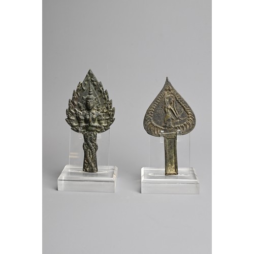 213 - TWO SOUTH EAST ASIAN LEAF-CAST CANDLE HOLDERS/POPILS, PROBABLY CAMBODIAN. The first in bronze, cast ... 