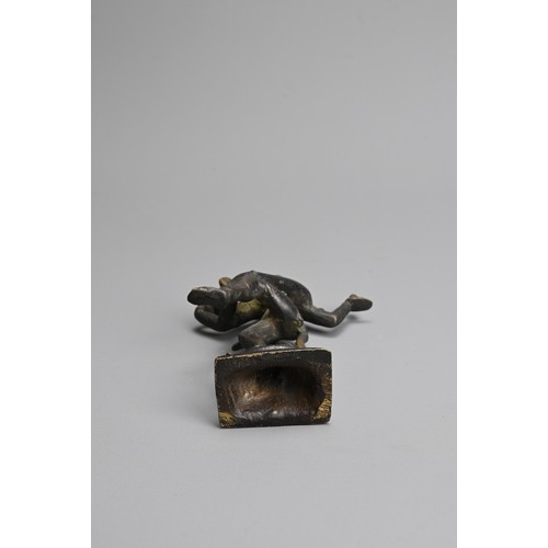 215 - AN INDIAN BRONZE FIGURE OF SHIVA. Depicted dancing, with right foot standing on the demon Apasmara, ... 