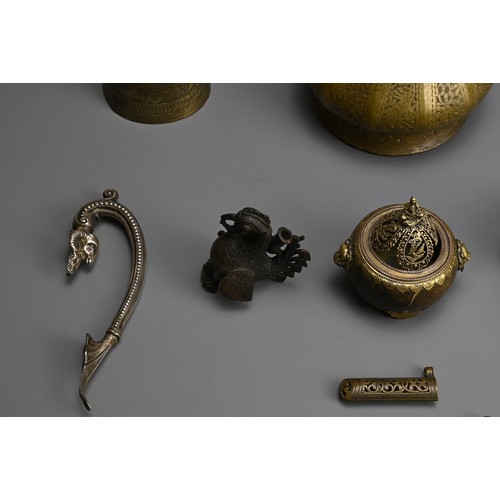 223 - A GROUP OF MIXED METAL ITEMS, INDIAN AND SOUTH EAST ASIAN. Comprising a bronze hookah base; An oil l... 