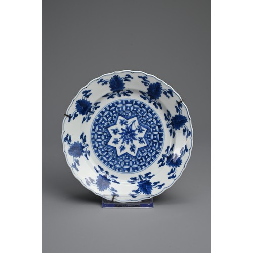 78 - A CHINESE BLUE AND WHITE PORCELAIN DISH, 18TH CENTURY. Of lobed form decorated with lotus motifs. Wi... 