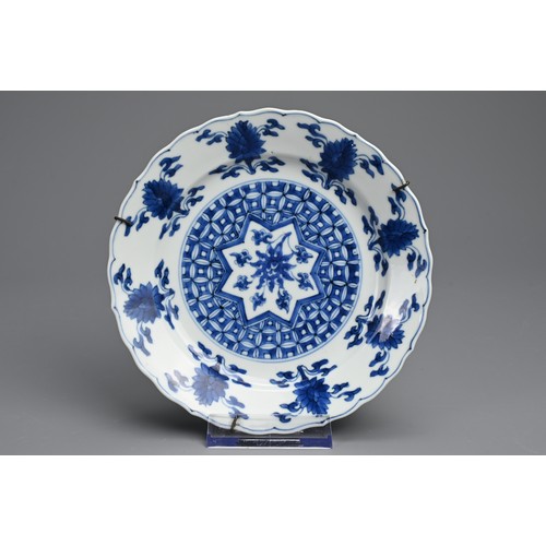 78 - A CHINESE BLUE AND WHITE PORCELAIN DISH, 18TH CENTURY. Of lobed form decorated with lotus motifs. Wi... 