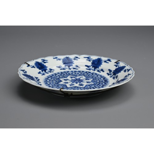 78 - A CHINESE BLUE AND WHITE PORCELAIN DISH, 18TH CENTURY. Of lobed form decorated with lotus motifs. Wi... 