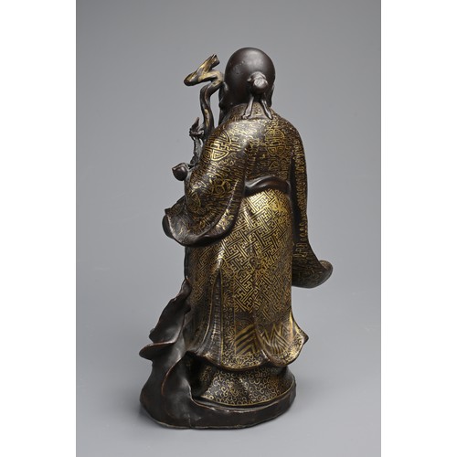 85 - A CHINESE BRONZE IMITATION PORCELAIN FIGURE OF SHOULAO, YOU CHANGZI (1874-1922). The brown glazed an... 