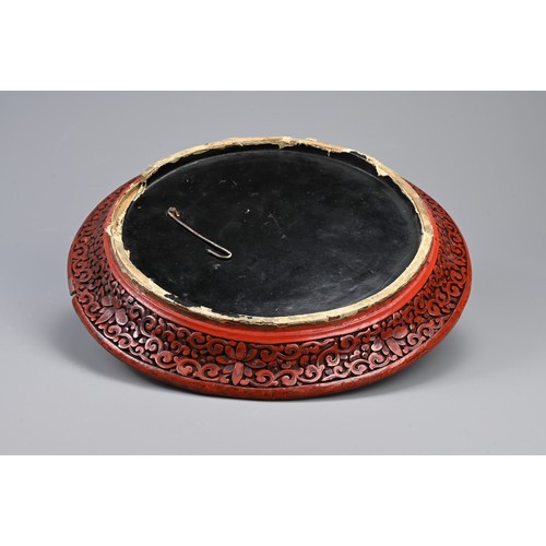 86 - A CHINESE CARVED CINNABAR LACQUER DISH, 19TH CENTURY. Carved in relief with scholars in landscape sc... 