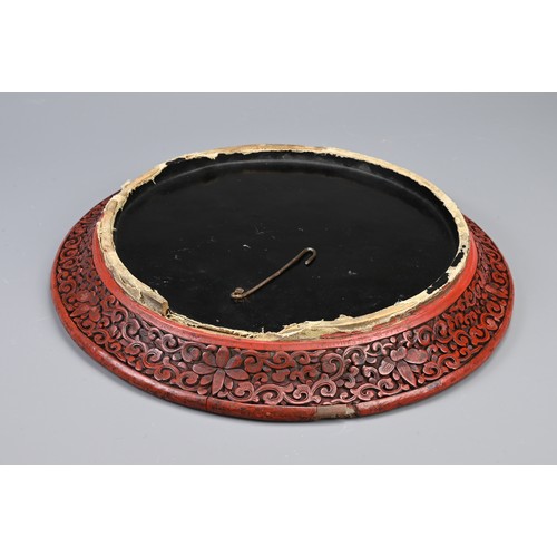 86 - A CHINESE CARVED CINNABAR LACQUER DISH, 19TH CENTURY. Carved in relief with scholars in landscape sc... 