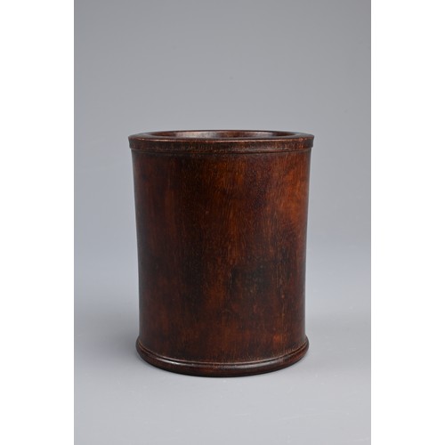 91 - A CHINESE HUANGHUALI BRUSH POT, BITONG, QING DYNASTY. Very slightly waisted cylindrical form with ca... 