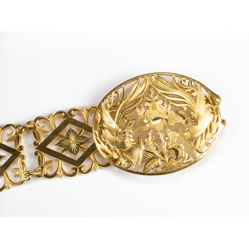 53 - A HEAVY HIGH CARAT PERANAKAN YELLOW GOLD BELT, MID 20TH CENTURY. Twenty three links with a pierced p... 