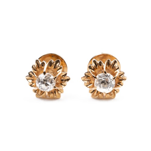 44 - A PAIR OF HIGH CARAT ROSE GOLD STUD DIAMOND EARRINGS, MID 20TH CENTURY. Single round cut diamonds mo... 