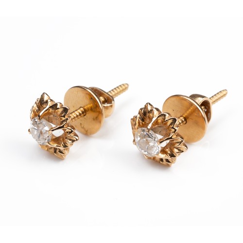 44 - A PAIR OF HIGH CARAT ROSE GOLD STUD DIAMOND EARRINGS, MID 20TH CENTURY. Single round cut diamonds mo... 