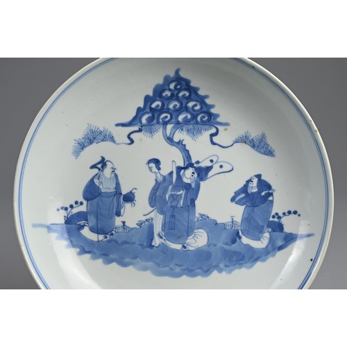 97 - A CHINESE BLUE AND WHITE PORCELAIN DISH, 19TH CENTURY. Featuring Sanxing, 'The Three Star Gods' stan... 