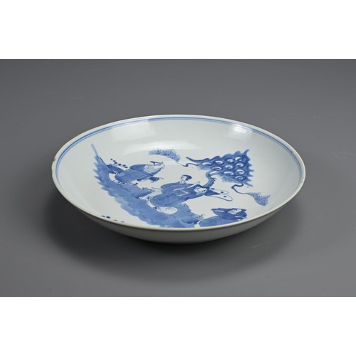 97 - A CHINESE BLUE AND WHITE PORCELAIN DISH, 19TH CENTURY. Featuring Sanxing, 'The Three Star Gods' stan... 