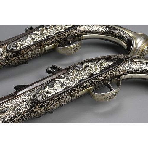 76 - A FINE PAIR OF SILVER INLAID FLINTLOCK PISTOLS BY PERRY, LONDON CIRCA 1780. Profusely inlaid with sc... 