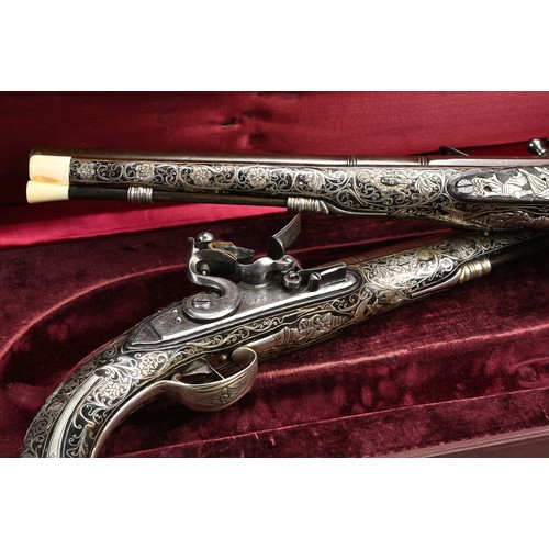 76 - A FINE PAIR OF SILVER INLAID FLINTLOCK PISTOLS BY PERRY, LONDON CIRCA 1780. Profusely inlaid with sc... 