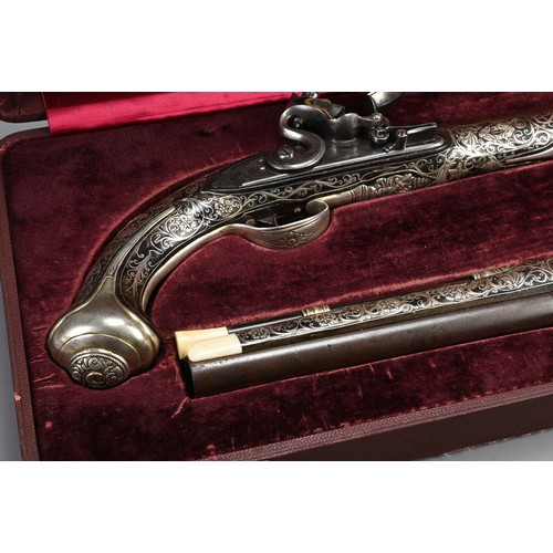 76 - A FINE PAIR OF SILVER INLAID FLINTLOCK PISTOLS BY PERRY, LONDON CIRCA 1780. Profusely inlaid with sc... 