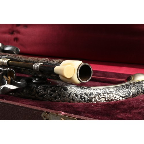 76 - A FINE PAIR OF SILVER INLAID FLINTLOCK PISTOLS BY PERRY, LONDON CIRCA 1780. Profusely inlaid with sc... 