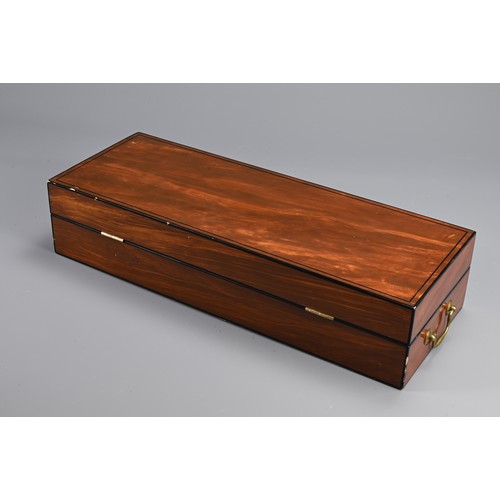 77 - AN ENGLISH REGENCY BOX WITH DISCIPLINE LEATHER WHIP SCOURGE. Rectangular mahogany box with bronze ha... 