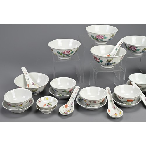 107 - A QUANTITY OF CHINESE FAMILLE ROSE PORCELAIN ITEMS, 20TH CENTURY. To include sixteen bowls of three ... 