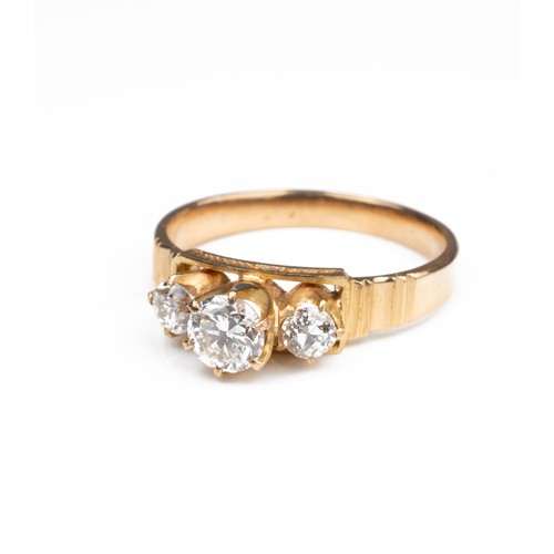 49 - A HIGHT CARAT YELLOW GOLD DIAMOND RING, MID 20TH CENTURY. With three round cut diamonds. Unmarked bu... 