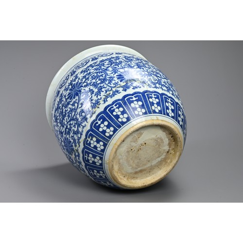 94 - A LARGE 19TH CENTURY CHINESE PORCELAIN BLUE AND JARDINIERE. Painted in the Ming style with lotus, tr... 