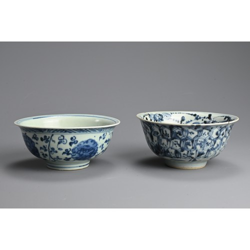 140 - TWO CHINESE PORCELAIN MING DYNASTY BLUE AND WHITE BOWLS. The first painted with lotus flowers amongs... 