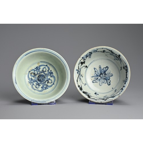 140 - TWO CHINESE PORCELAIN MING DYNASTY BLUE AND WHITE BOWLS. The first painted with lotus flowers amongs... 