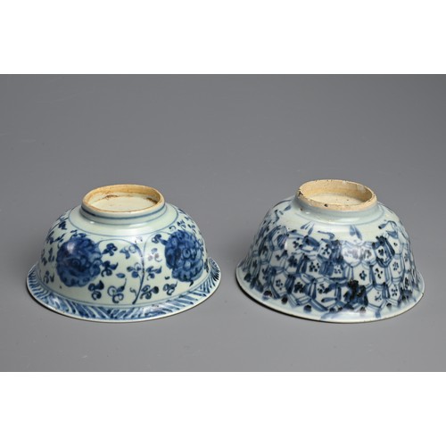 140 - TWO CHINESE PORCELAIN MING DYNASTY BLUE AND WHITE BOWLS. The first painted with lotus flowers amongs... 