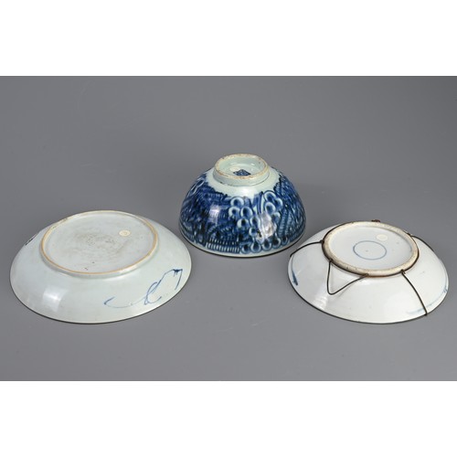 142 - A CHINESE PORCELAIN KANGXI (1661-1722) BLUE AND WHITE DISH, A PEONY DISH AND A BOWL. The first paint... 