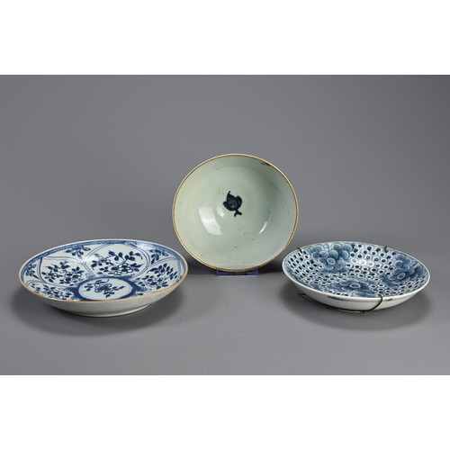 142 - A CHINESE PORCELAIN KANGXI (1661-1722) BLUE AND WHITE DISH, A PEONY DISH AND A BOWL. The first paint... 