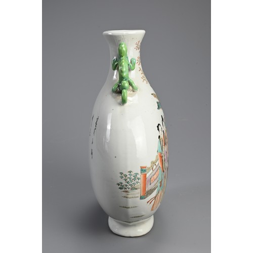 151 - A CHINESE FAMILLE ROSE PORCELAIN MOONFLASK. With green glazed chilong form handles, decorated with l... 