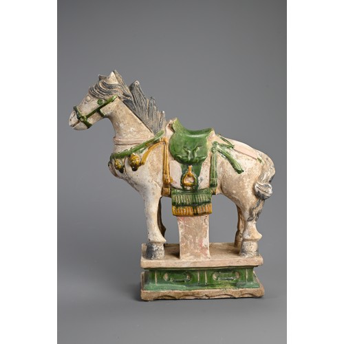 170 - A LARGE CHINESE SANCAI GLAZED POTTERY MODEL OF A HORSE, MING DYNASTY (1368-1644). Standing four squa... 