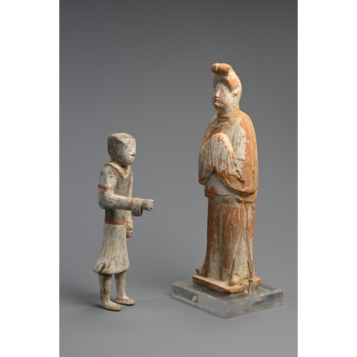 174 - A CHINESE HAN DYNASTY (206 BC-220 AD) PAINTED POTTERY TOMB FIGURE OF AN ATTENDANT, A TANG DYNASTY (6... 