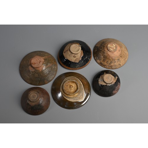 183 - A GROUP OF CHINESE BROWN GLAZED POTTERY BOWLS, 12/13TH CENTURY. Of various forms and sizes. 10cm - 1... 