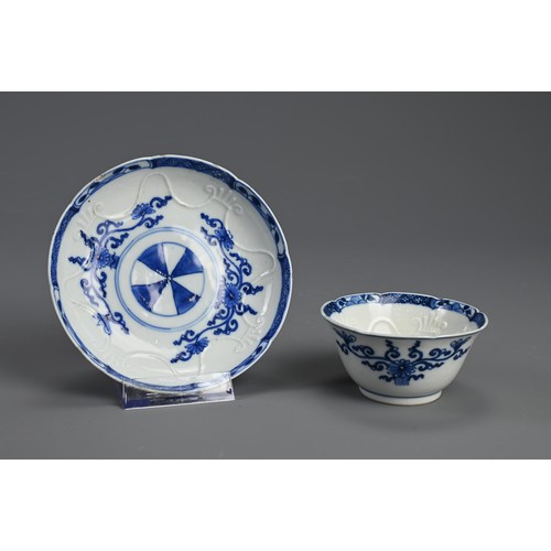 190 - A EUROPEAN BLUE AND WHITE PORCELAIN CUP AND SAUCER, 18/19TH CENTURY. Lobed and moulded cup and sauce... 