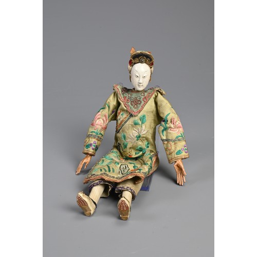 199 - A CHINESE OPERA DOLL, 19/20TH CENTURY. Painted wooden figure dressed in embroidered robes. 26cm leng... 