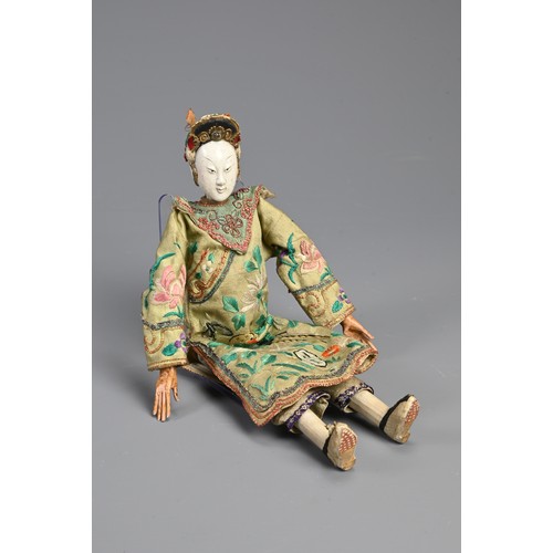 199 - A CHINESE OPERA DOLL, 19/20TH CENTURY. Painted wooden figure dressed in embroidered robes. 26cm leng... 