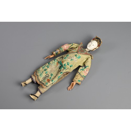 199 - A CHINESE OPERA DOLL, 19/20TH CENTURY. Painted wooden figure dressed in embroidered robes. 26cm leng... 