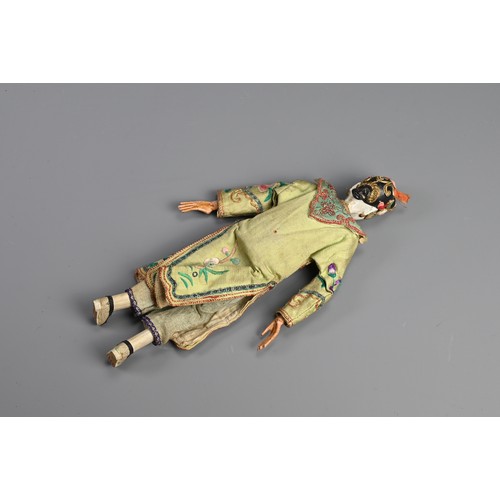 199 - A CHINESE OPERA DOLL, 19/20TH CENTURY. Painted wooden figure dressed in embroidered robes. 26cm leng... 