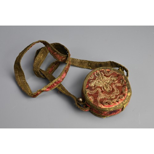 200 - A TIBETAN WHITE METAL AND COPPER GAU BOX, EARLY 20TH CENTURY. Of circular form with central Buddha e... 