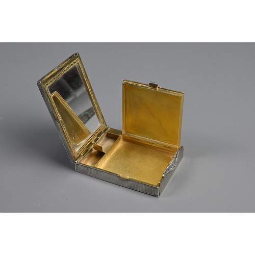 74 - A SILVER AND BLACK ENAMELLED CASE BOX WITH TWO SILVER COMPACTS, EARLY 20TH CENTURY. To include a sil... 