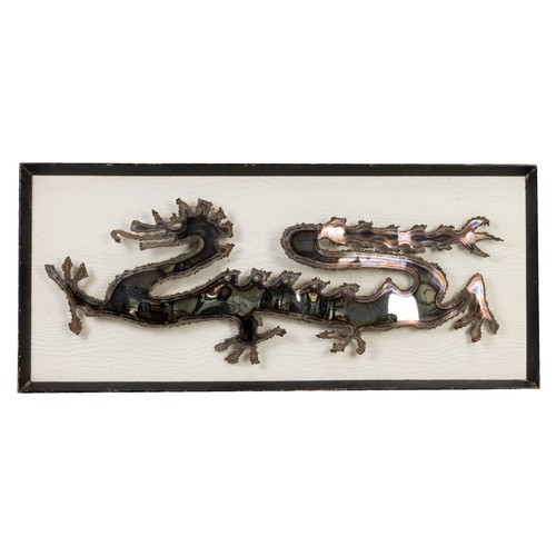 276 - A MID CENTURY CUT STAINLESS STEEL DRAGON, ATTRIBUTED TO MARLER HAYLEY. Mounted and framed. Frame siz... 