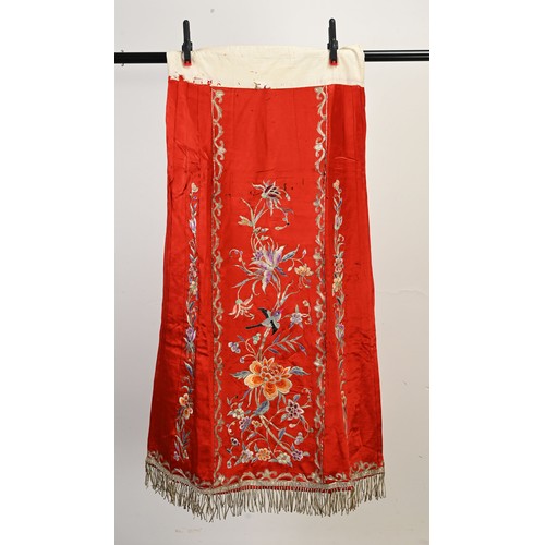 227 - TWO 20TH CENTURY CHINESE EMBROIDERED SILK SKIRTS AND A JACKET. The first skirt in black silk embroid... 