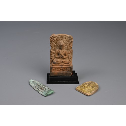 212 - AN INDIAN BHIMA TERRACOTTA TEMPLE STELE AND TWO OTHERS.  The first moulded with a seated Buddha befo... 