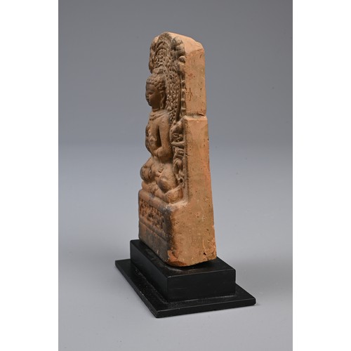 212 - AN INDIAN BHIMA TERRACOTTA TEMPLE STELE AND TWO OTHERS.  The first moulded with a seated Buddha befo... 