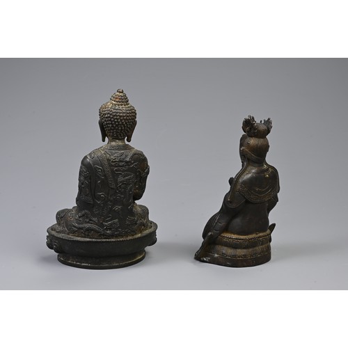 207 - TWO SINO TIBETAN BRONZE METAL BUDDHISTIC FIGURES. Predominantly 20th century, including: a Tibetan s... 