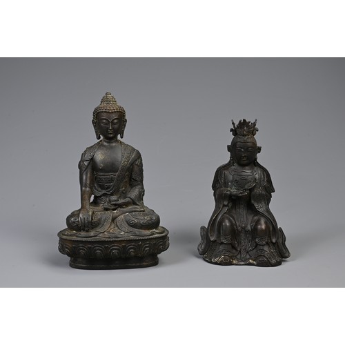 207 - TWO SINO TIBETAN BRONZE METAL BUDDHISTIC FIGURES. Predominantly 20th century, including: a Tibetan s... 