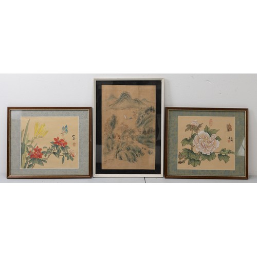 284 - THREE 20TH CENTURY FRAMED CHINESE SILK PAINTINGS. The first depicting a figure in a boat on a lake i... 