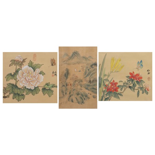 284 - THREE 20TH CENTURY FRAMED CHINESE SILK PAINTINGS. The first depicting a figure in a boat on a lake i... 