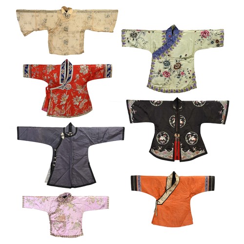 228 - A GROUP OF CHINESE EMBROIDERED SILK AND GAUZE CHILDREN'S ROBES, EARLY-LATE 20TH CENTURY. Comprising:... 